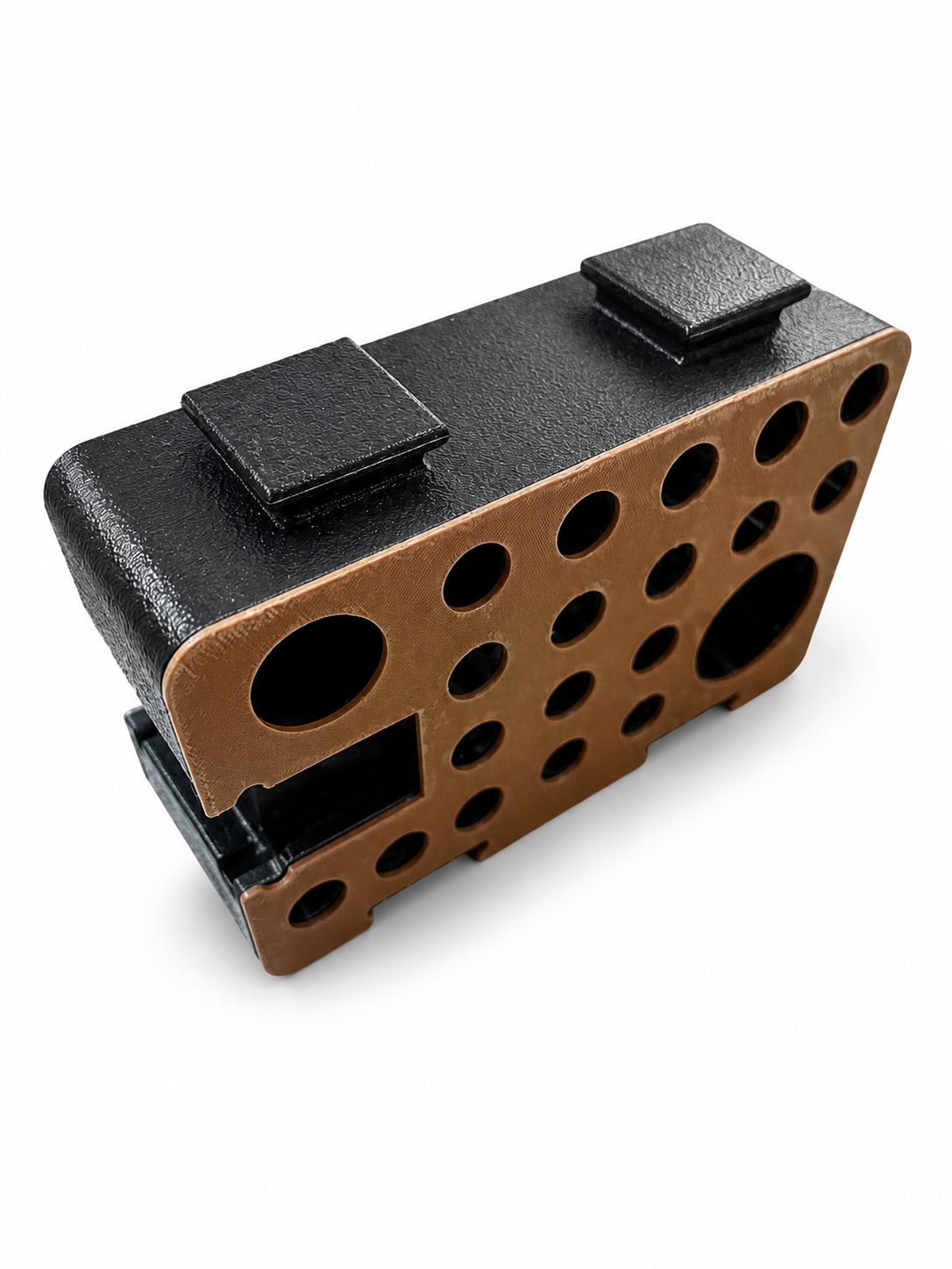 Single Scentcorps D-Block showing the coyote-tan drilled face and black interlocking studs